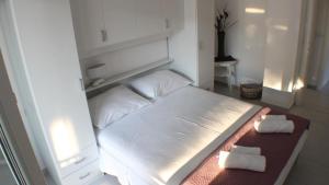 Cama o camas de una habitación en Schönes Appartement in Promajna mit Terrasse und Neben dem Strand