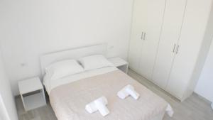 Cama o camas de una habitación en Charmantes Appartement in Promajna und Neben dem Strand