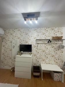 A kitchen or kitchenette at ORTIGIA 26