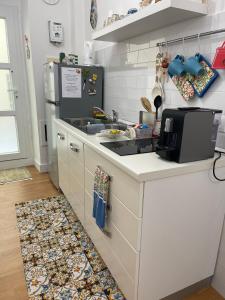 A kitchen or kitchenette at ORTIGIA 26 Még 25 kép