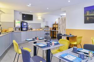 Kuchyň nebo kuchyňský kout v ubytování Adonis Hotel Strasbourg + 37 fotografií