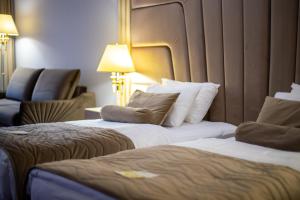 Letto o letti in una camera di A Hoteli - Hotel Park
