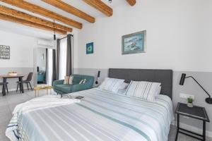 a bedroom with a large bed and a table at Luxury Studio Adriatic 1 in Split