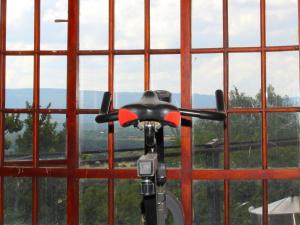 a bike looking out of a large window at Sable Mountain in Hekpoort