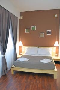 Postel nebo postele na pokoji v ubytování Bio Hotel Palermo