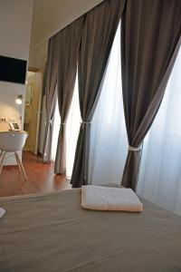 Postel nebo postele na pokoji v ubytování Bio Hotel Palermo