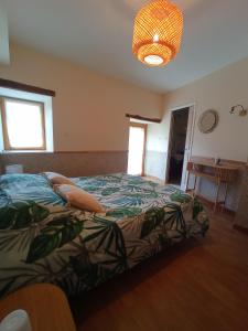 Postel nebo postele na pokoji v ubytování Chambres d'hôtes La Roche