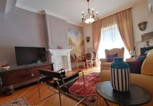 Televízia a/alebo spoločenská miestnosť v ubytovaní B&B Buon Cammino Tuscia Viterbo - colazione inclusa - convenzionato con impianti termali