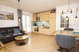 Kuchyň nebo kuchyňský kout v ubytování strandnahe Ferienwohnung mit 2 Balkonen - Haus am Kurpark FeWo 12 + 17 fotografií