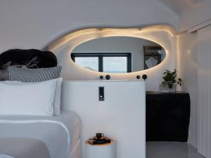 Olvos Luxury Suites客房内的一张或多张床位