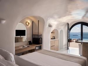 Olvos Luxury Suites客房内的一张或多张床位