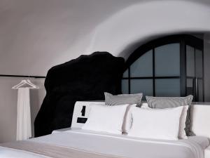 Olvos Luxury Suites客房内的一张或多张床位