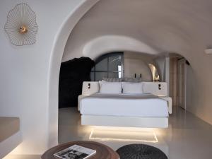 Olvos Luxury Suites客房内的一张或多张床位