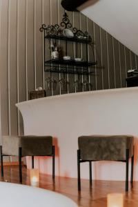 Area soggiorno di L'Eden - Suite privative avec jacuzzi et sauna