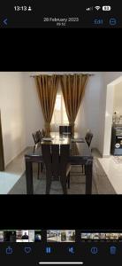 a picture of a dining room with a table and chairs at PARADISE VIEW #73 in Bathurst