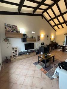 a living room with a couch and a table at Appartamento spazioso in centro in Viterbo