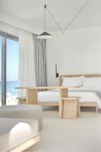 Postel nebo postele na pokoji v ubytování Largo Seaside Retreat + 37 fotografií