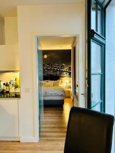 Ein Bett oder Betten in einem Zimmer der Unterkunft Downtown Apartments Leipzig