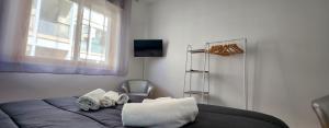 Postel nebo postele na pokoji v ubytování Rotolo Suite 502