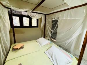 Postel nebo postele na pokoji v ubytování Hostel 98