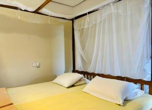 Postel nebo postele na pokoji v ubytování Hostel 98