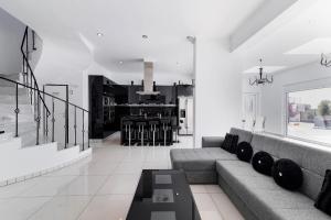 a living room with a couch and a table at Diamond Villa in Gennadi