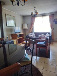 A seating area at Casa en Villarrica