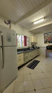 A kitchen or kitchenette at Merlin Dreams