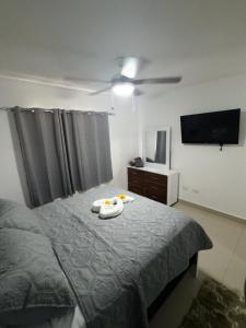 Ένα ή περισσότερα κρεβάτια σε δωμάτιο στο Apartamento Coral azul
