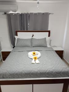 Ένα ή περισσότερα κρεβάτια σε δωμάτιο στο Apartamento Coral azul +9 φωτογραφίες
