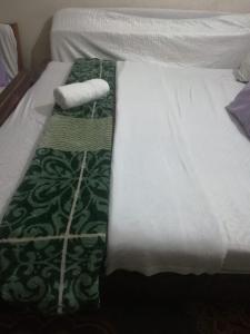 Lova arba lovos apgyvendinimo įstaigoje Sharjah Family hotel