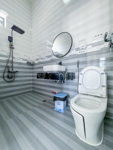 Koupelna v ubytování Homestay Tiến Đạt + 23 fotografií