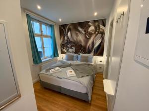 Ein Bett oder Betten in einem Zimmer der Unterkunft Downtown Apartments Leipzig