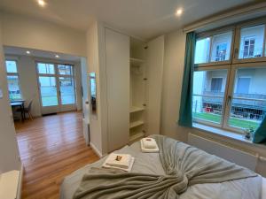 Ein Bett oder Betten in einem Zimmer der Unterkunft Downtown Apartments Leipzig