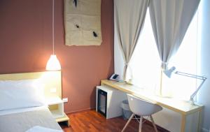 Postel nebo postele na pokoji v ubytování Bio Hotel Palermo