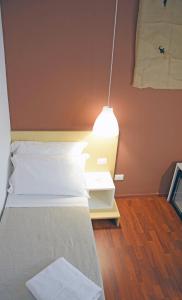 Postel nebo postele na pokoji v ubytování Bio Hotel Palermo