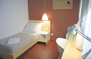 Postel nebo postele na pokoji v ubytování Bio Hotel Palermo