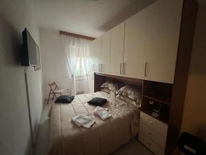 Postel nebo postele na pokoji v ubytování Alloggio turistico FRANCY HOME