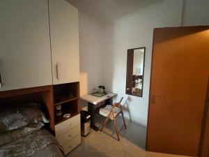 Postel nebo postele na pokoji v ubytování Alloggio turistico FRANCY HOME