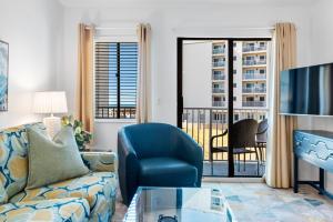 a living room with a couch and a tv at Gulf Shores Plantation-East 3210 in Gulf Shores