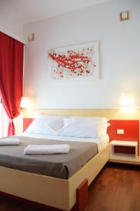 Postel nebo postele na pokoji v ubytování Bio Hotel Palermo