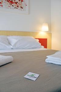 Postel nebo postele na pokoji v ubytování Bio Hotel Palermo