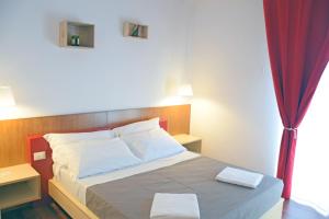 Postel nebo postele na pokoji v ubytování Bio Hotel Palermo