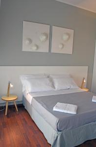 Postel nebo postele na pokoji v ubytování Bio Hotel Palermo