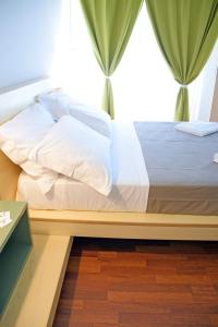 Postel nebo postele na pokoji v ubytování Bio Hotel Palermo