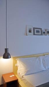 Postel nebo postele na pokoji v ubytování Bio Hotel Palermo