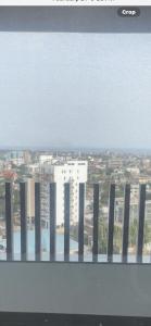 a view of a city from a window at Kornialle in Accra