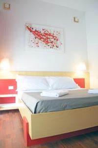 Postel nebo postele na pokoji v ubytování Bio Hotel Palermo