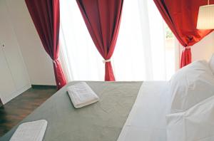 Postel nebo postele na pokoji v ubytování Bio Hotel Palermo