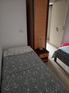 Ένα ή περισσότερα κρεβάτια σε δωμάτιο στο MORADIAS I02/C